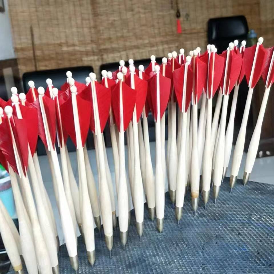 The dart red feather