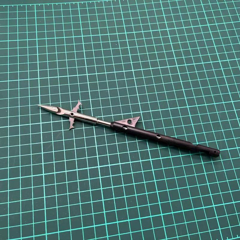 One shark darts behind the black pole