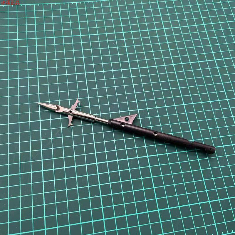 The black rod is behind the shark darts