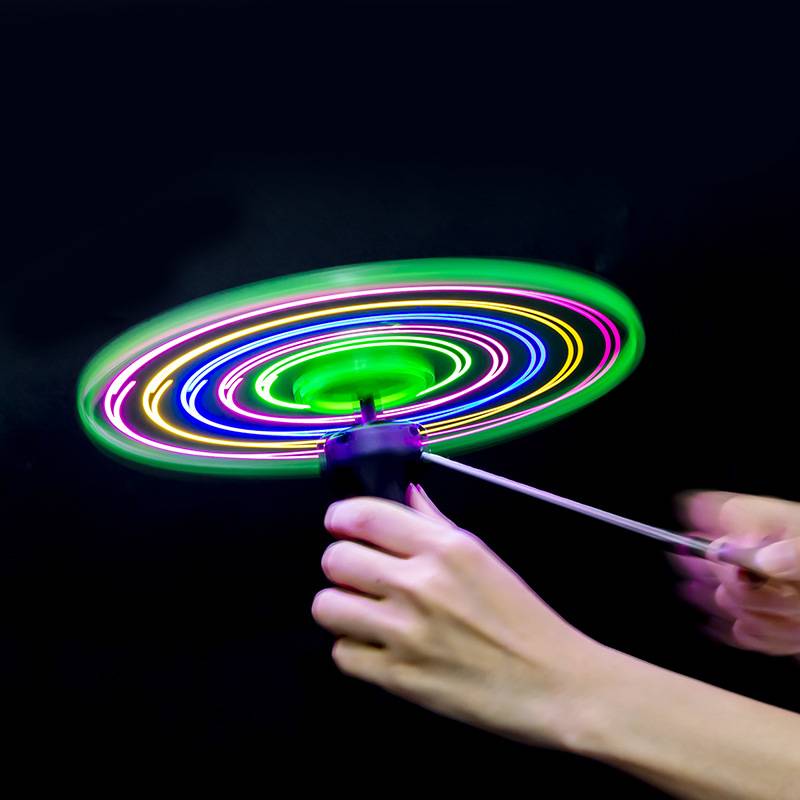 The new colorful light emitting flying saucer 5 light pull line flying saucer flying sky fairy six light flying disk children's land outdoor toys