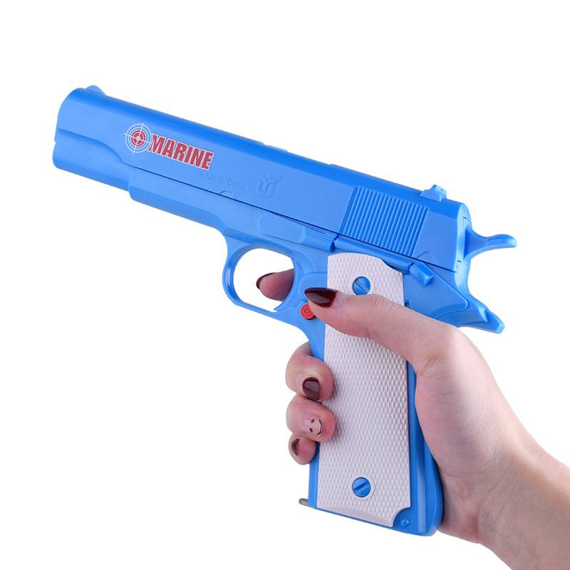 Children's soft shotgun toys can fire soft bombs shooting against the battle glasses handcuffed boy