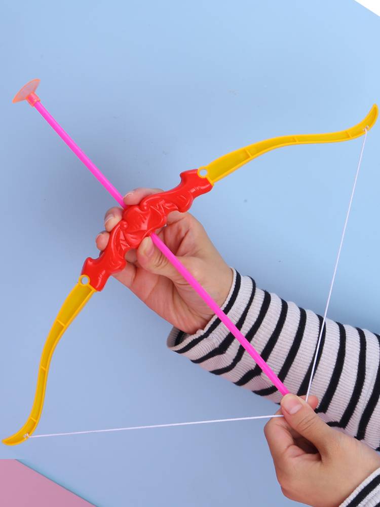 A soft-bullet suction bow and arrow plastic with a safety imitation of a shooting weapon for children in the outdoors toy