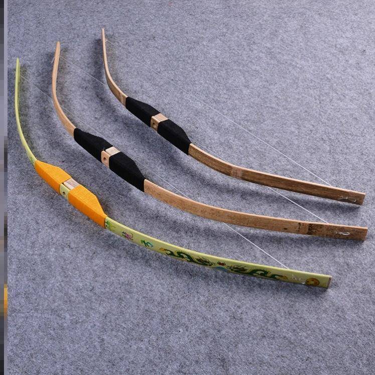 Outdoor shooting photography COS costume filming adult children stage performances to perform traditional bamboo, wood bow and arrow model