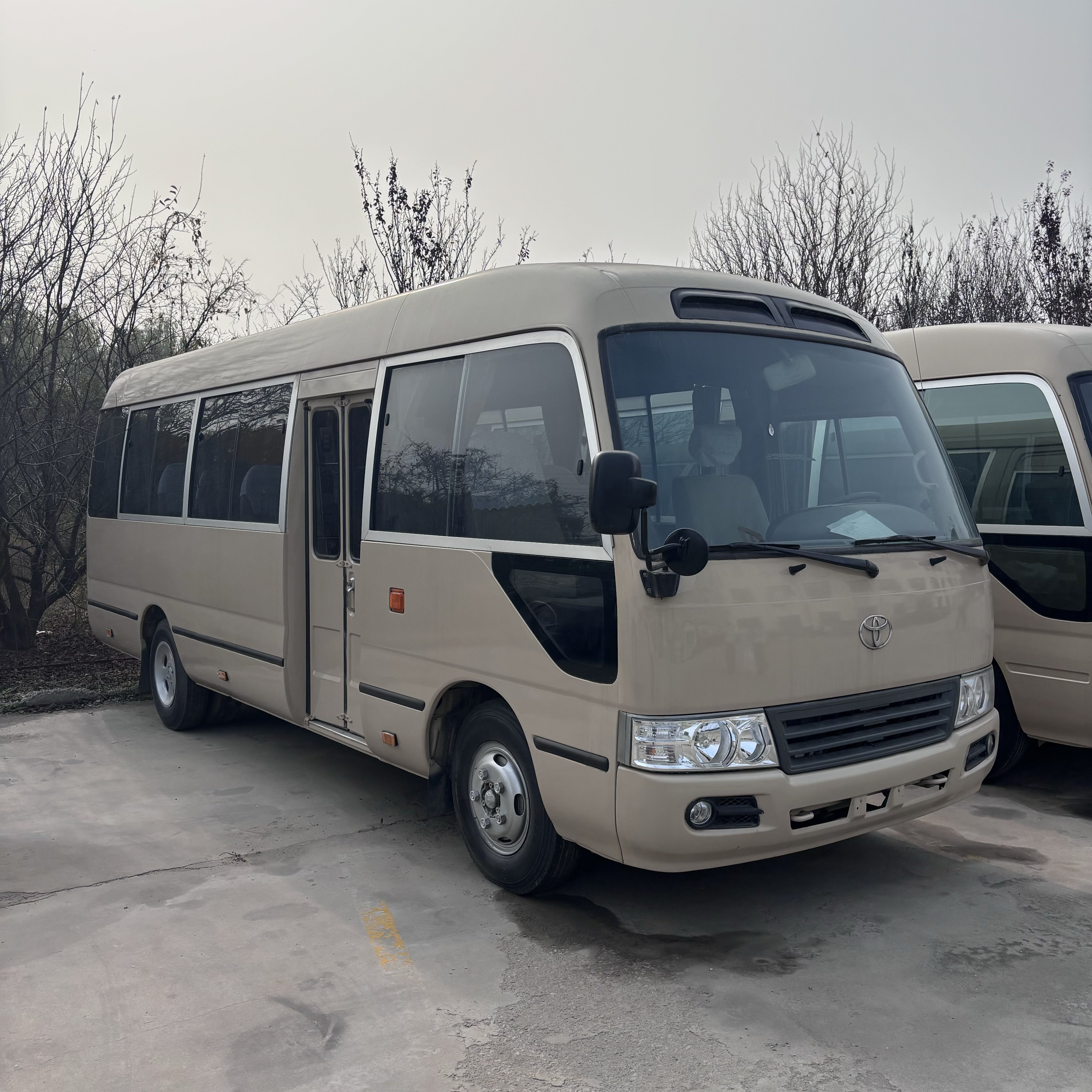Used Toyota Coaster Bus Diesel Engine 30-Seater Passenger Coaches for Sale at Low Price