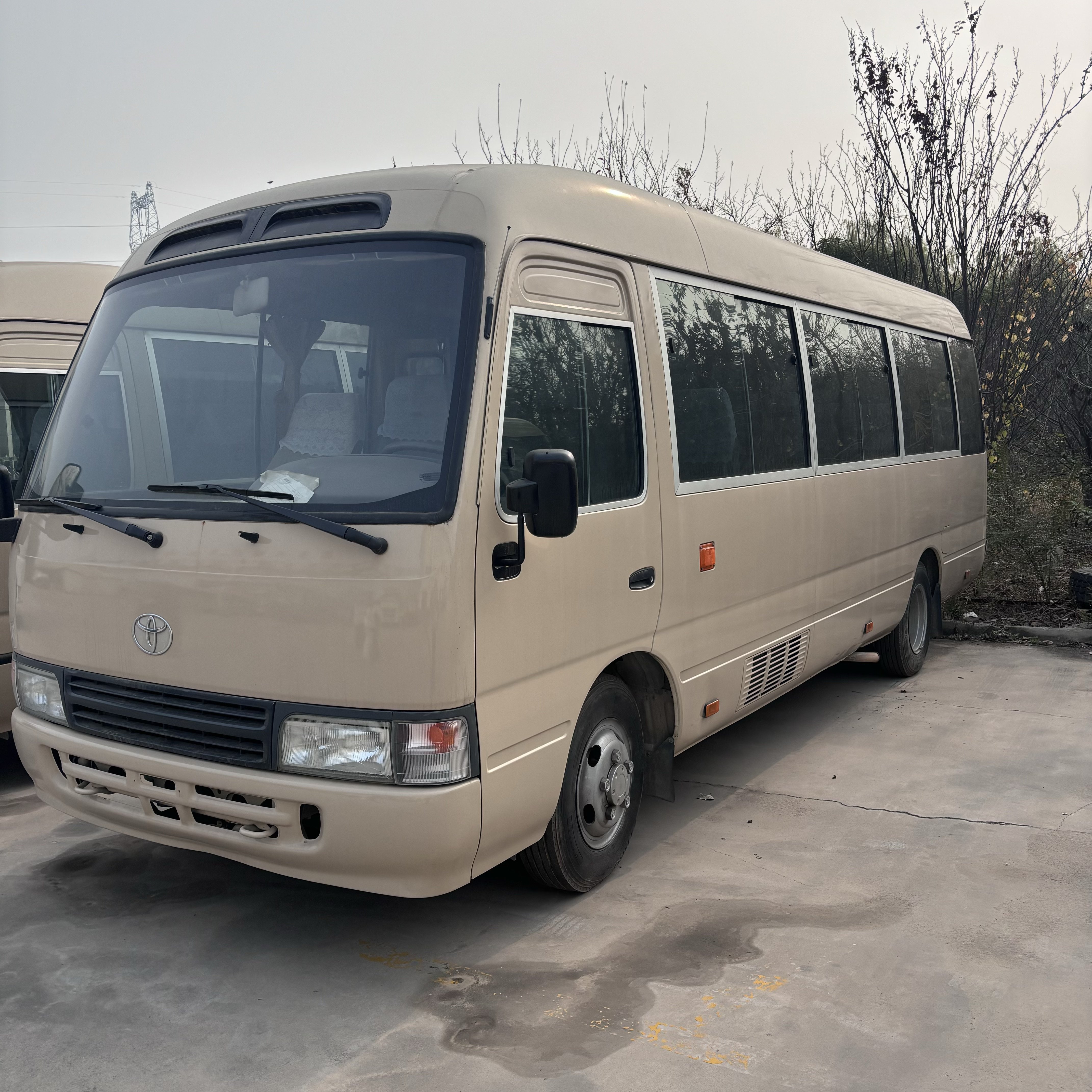 Used Toyota Coaster Bus Diesel Engine 30-Seater Passenger Coaches for Sale at Low Price