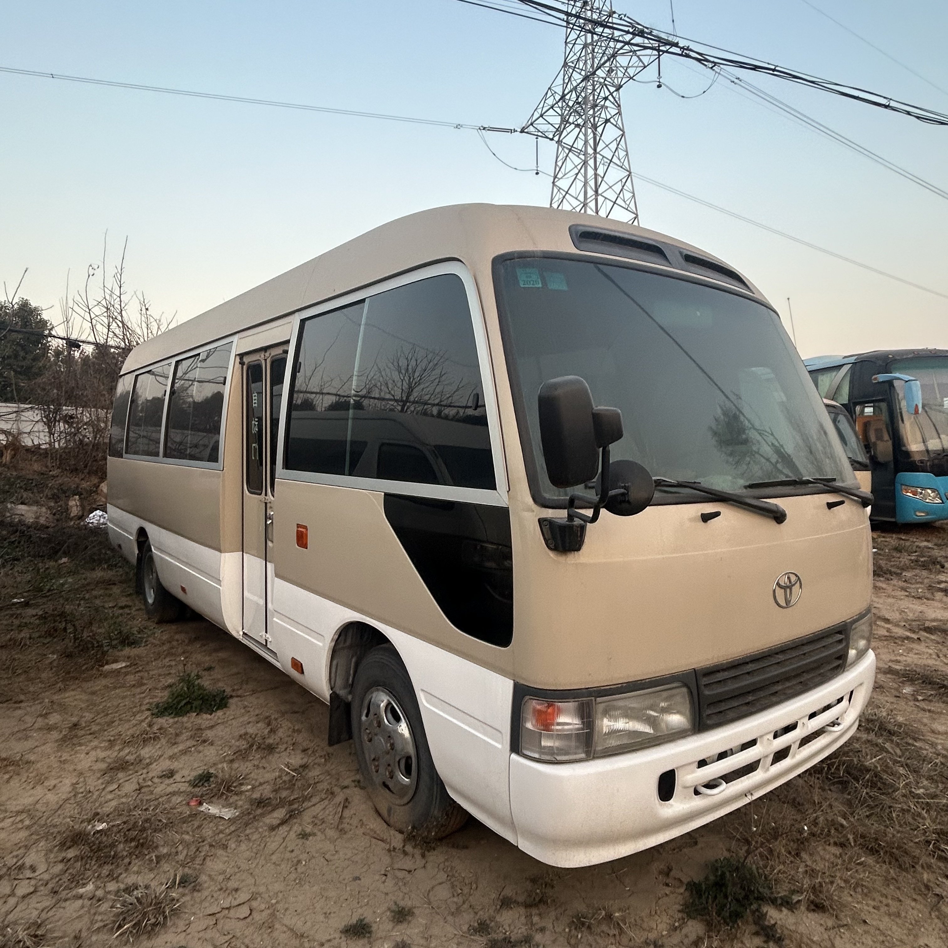 Online Wholesale VIP Coaches Second Hand Buses and Coaster Autobus To-yo-ta Coaster 30 Seaters Passenger