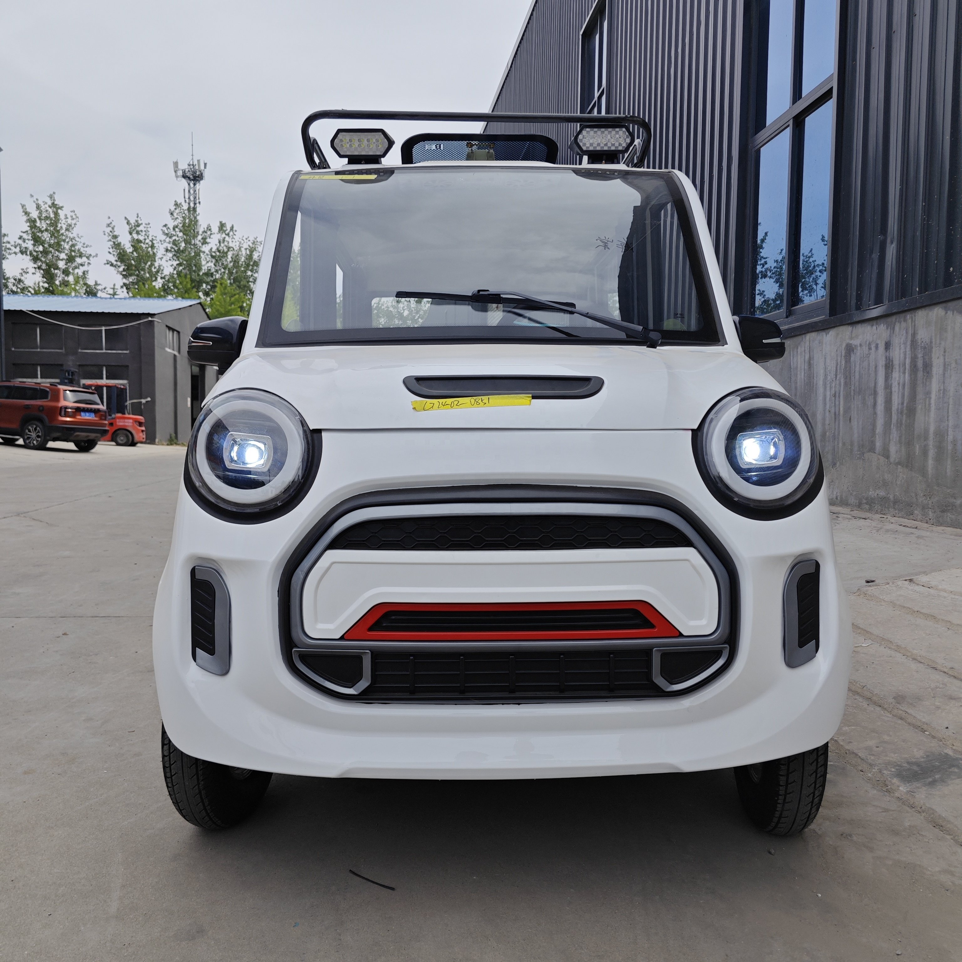 Hot Selling Four Wheels Electric Truck Bus Baggage Holder Mini Car New Energy Vehicle Made in China Hybrid MINI Ev BUS