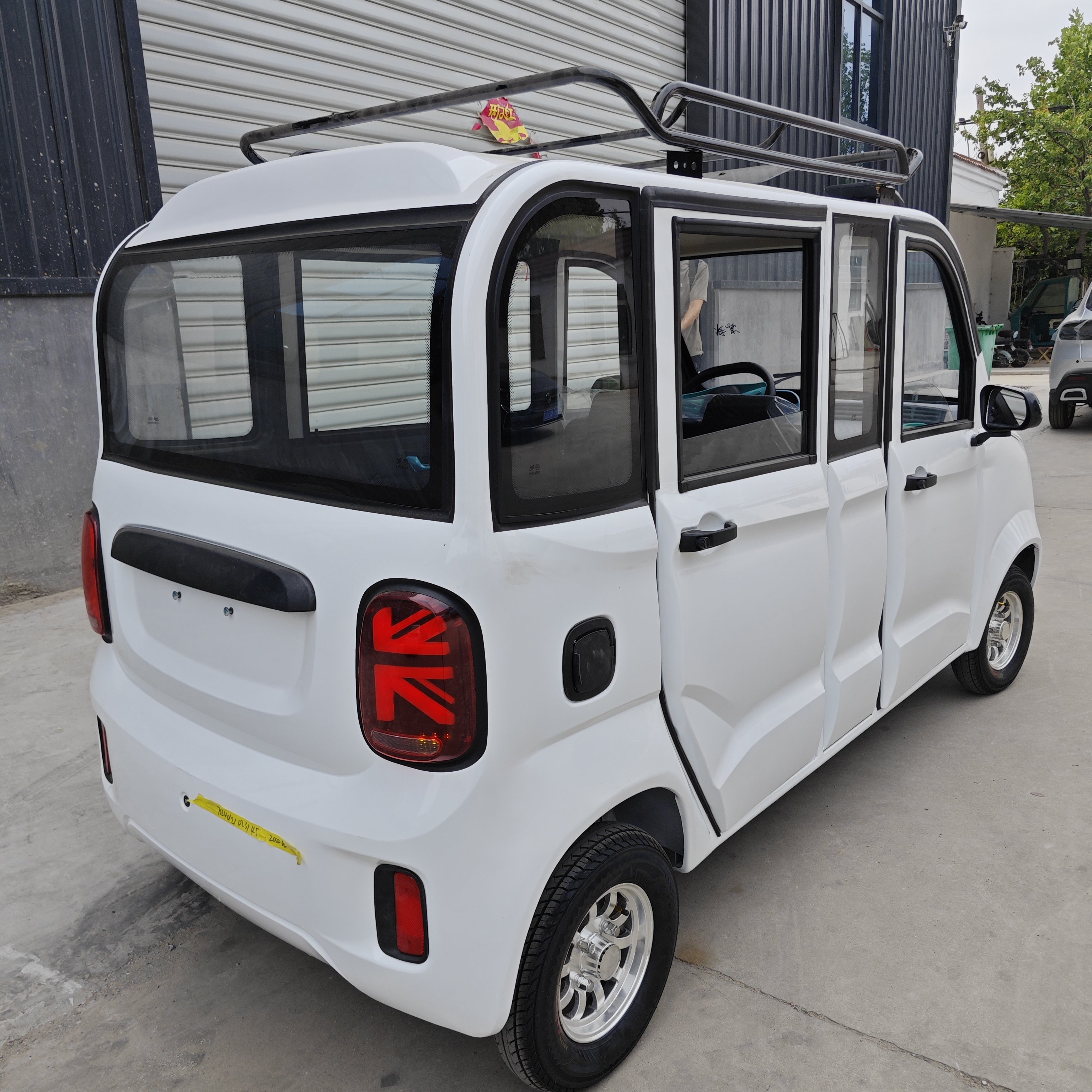 New Design Tuk Tuk Four Wheel Electric Mini Car Lead Acid Battery Cheap Electric Vehicle Made in China Hybrid MINI Ev Bus