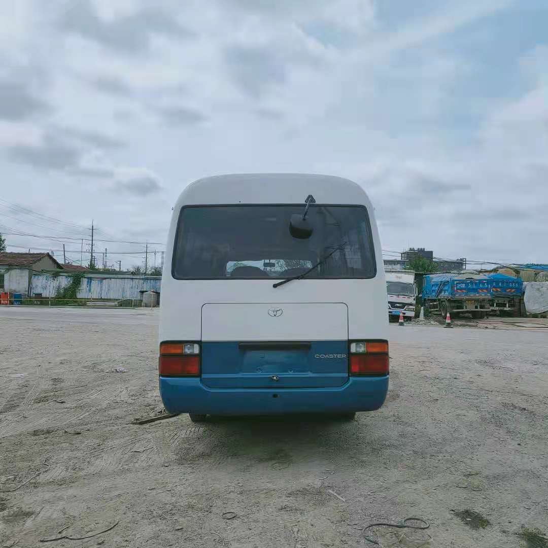 Good Condition 30 Seats Used toyota Coaster Bus Original Japanese Diesel 1hz Engine Leaf Spring Suspension 6 Cylinder for Sale