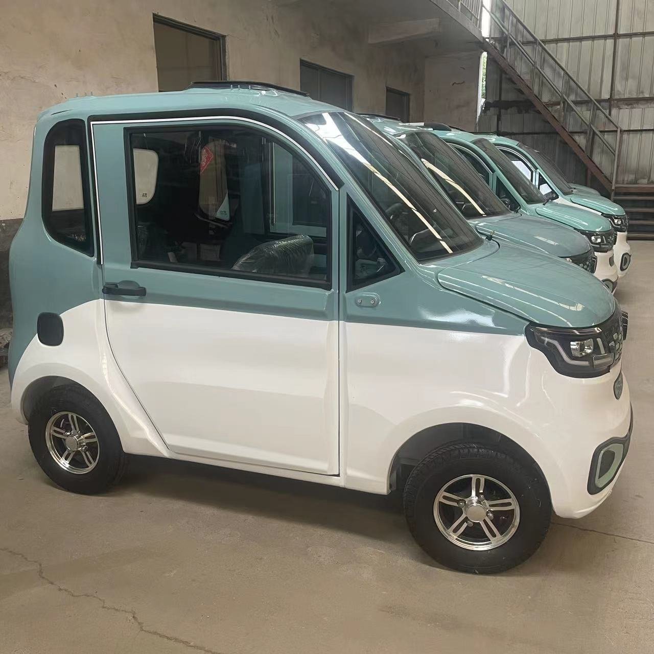 Top Selling Customizable 4 Seater Wheel Mini Electric Vehicle Small Ev Cars Chinese Mini Cheap Electric Car for Europe Adults