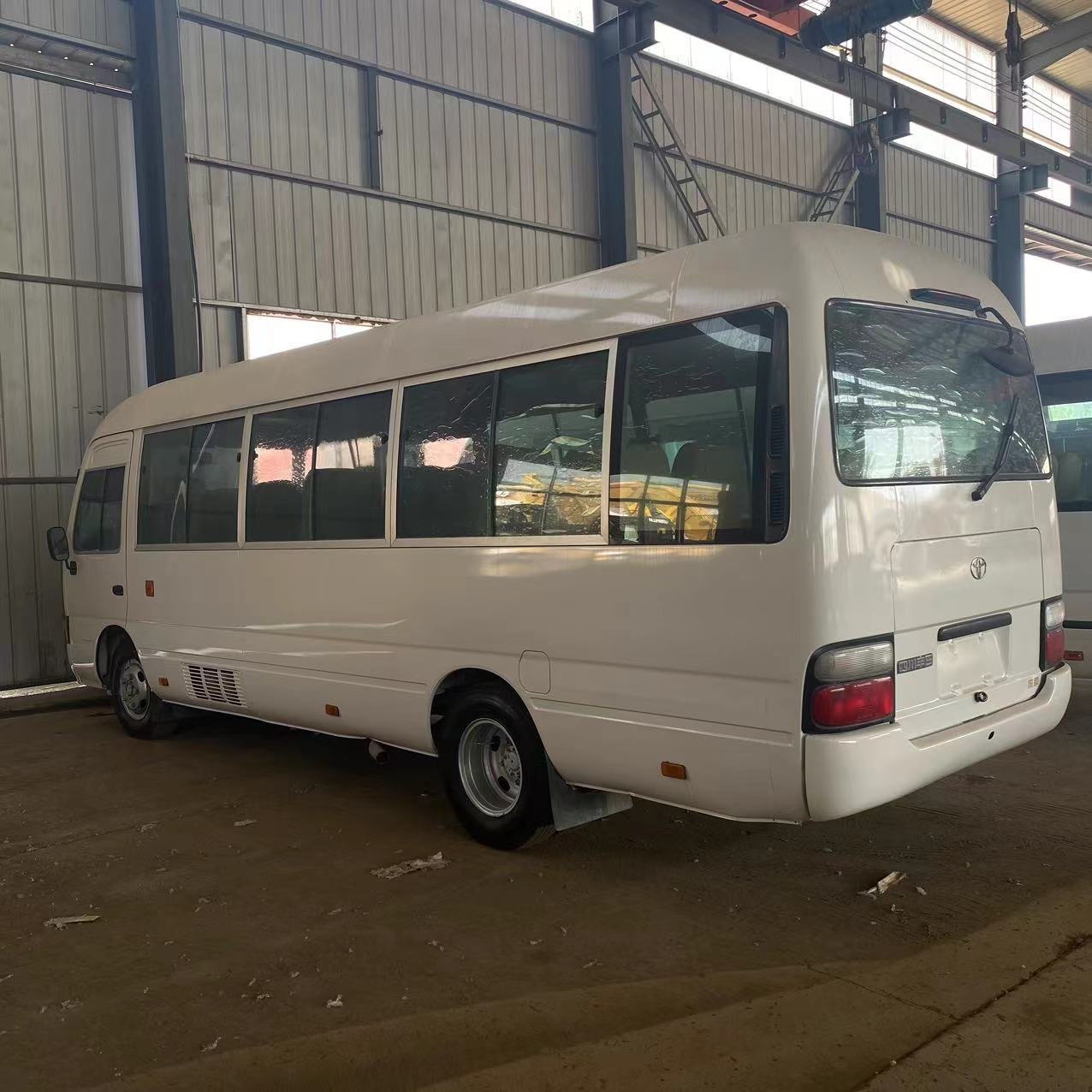 USED 30-seat diesel Engine Coaster Mini Bus Exported to Africa