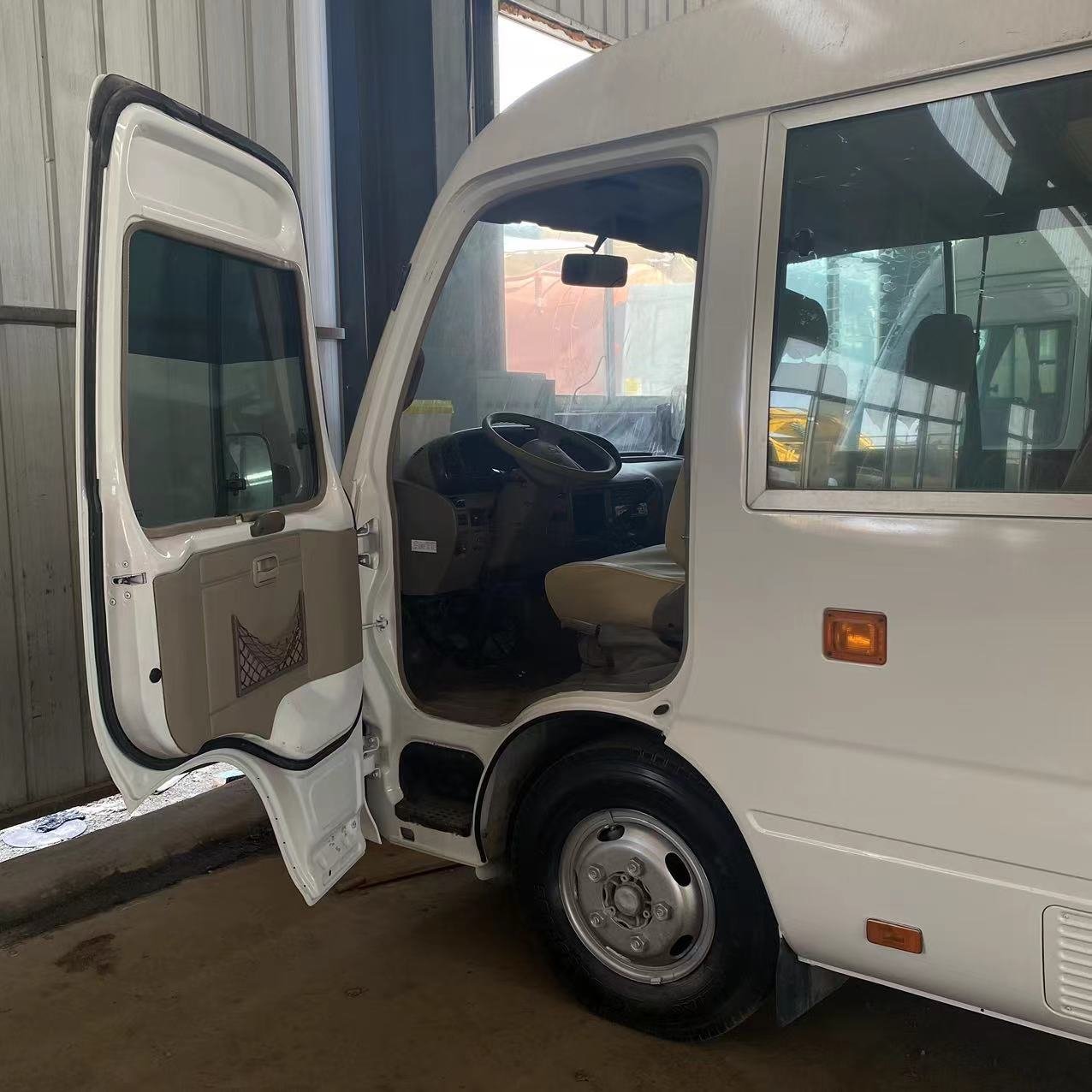 USED 30-seat diesel Engine Coaster Mini Bus Exported to Africa