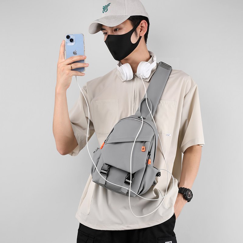 Wholesale new motorcycle anti-theft chest bag Men's waterproof sling crossbody bag with headphone hole riding bag