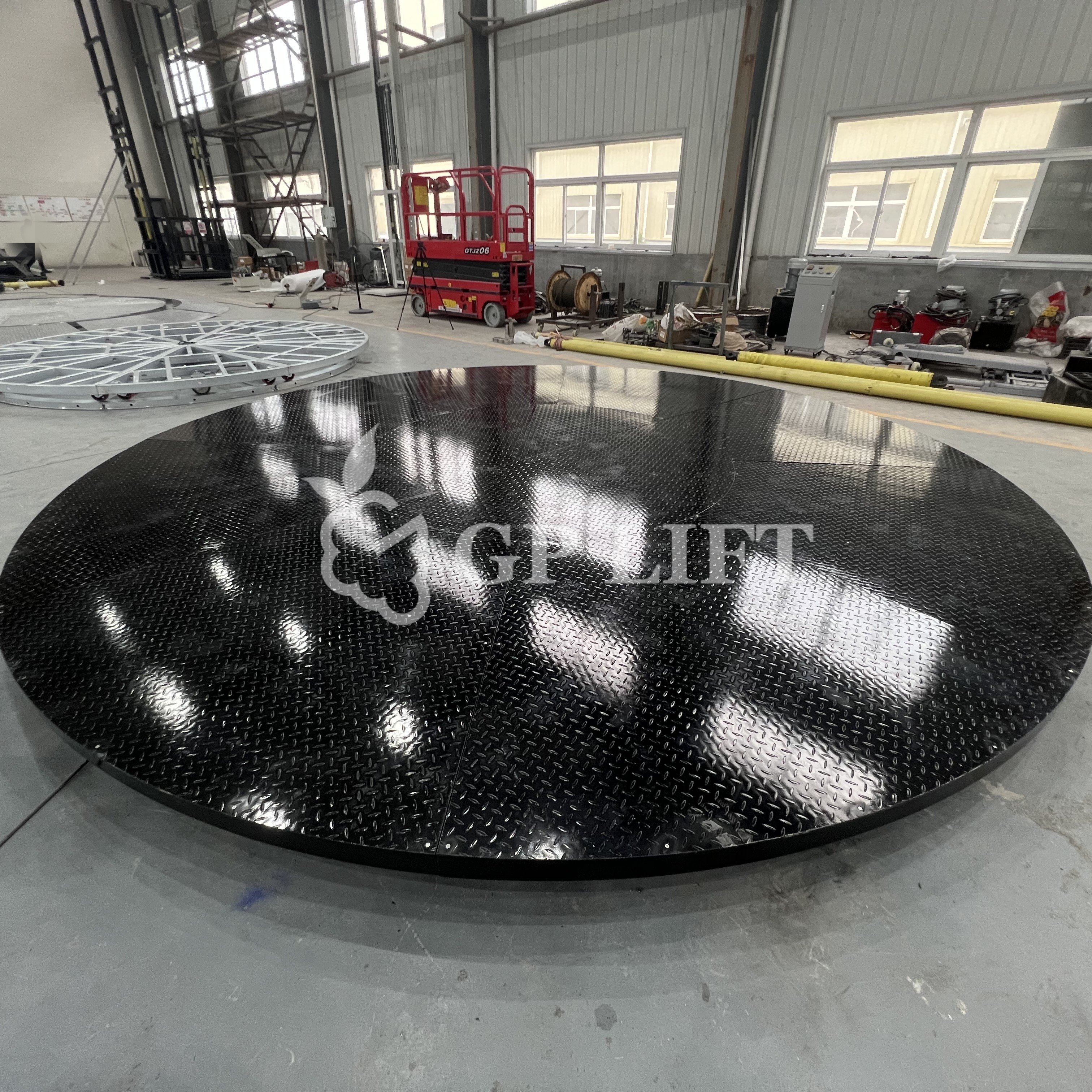 car showing automatic 360 degree display motorcycle electric motor parking platform rotating outside car turntable platform
